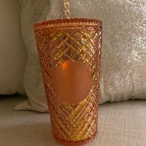 Grande rose gold Starbucks cups
